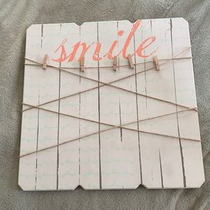 Picture hanging sign